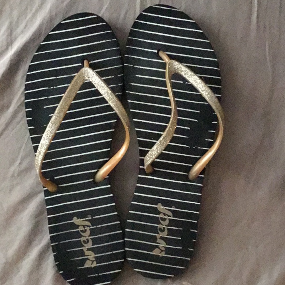 Reef Women's Black and Gold Flip Flops